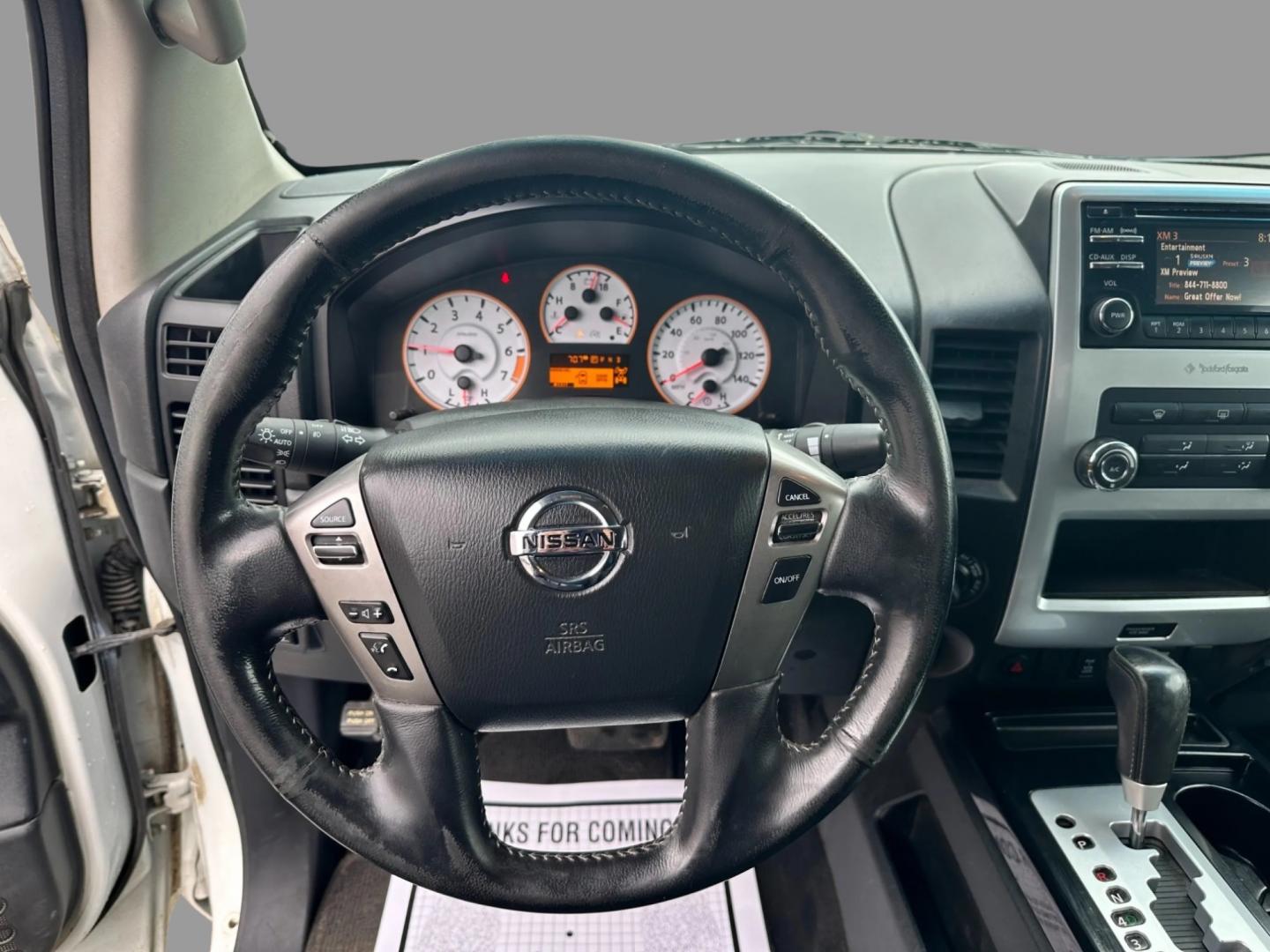 2013 White /Black Nissan Titan Pro-4X (1N6AA0EC0DN) with an 5.6L DOHC 32V V8 engine, Automatic transmission, located at 547 E. Main St., Orwell, OH, 44076, (440) 437-5893, 41.535435, -80.847855 - This 2013 Nissan Titan Pro-4X Crew Cab is a capable and well-equipped full-size pickup truck. It features a powerful 5.6L Endurance V8 engine paired with a 5-speed automatic transmission, a locking rear differential for improved traction, and a maximum towing capacity of 9,300 pounds. The truck is l - Photo#15